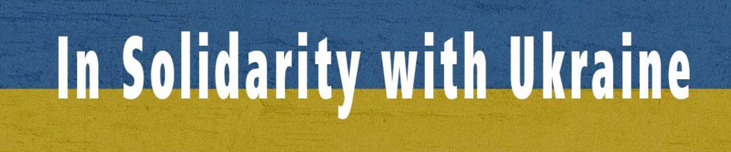 Ukrainian flag, blue over yellow stripe in sandpaper style. Text. Solidarity with Ukraine