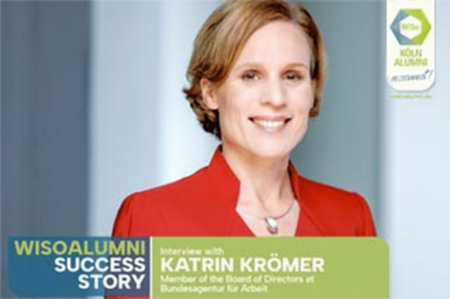 Portrait of Dr. Katrin Krömer, Member of the Board of Directors at the Federal Employment Agency. She is wearing a red blazer and smiling at the camera. The background shows a blurred, professional indoor setting. Text on the image: 'WiSo Alumni Success Story. Interview with Katrin Krömer, Member of the Board of Directors at Federal Employment Agency.'